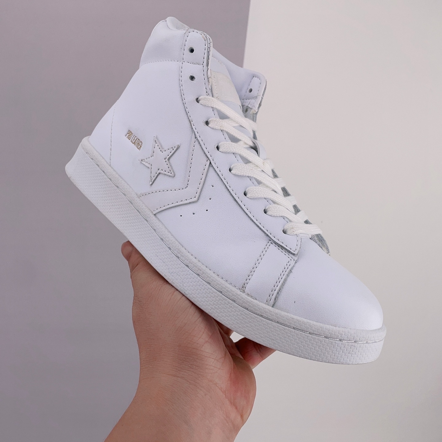 Converse Pro Leather Hi Triple White 166810C - Classic Style and Versatility